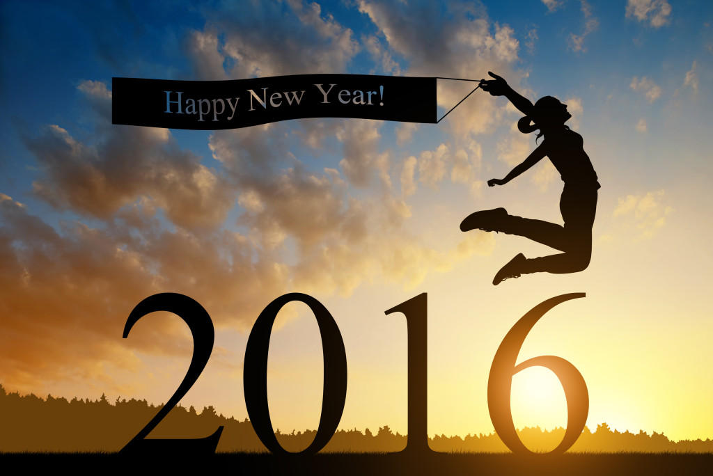 Girl jumps to the New Year 2016 at sunset