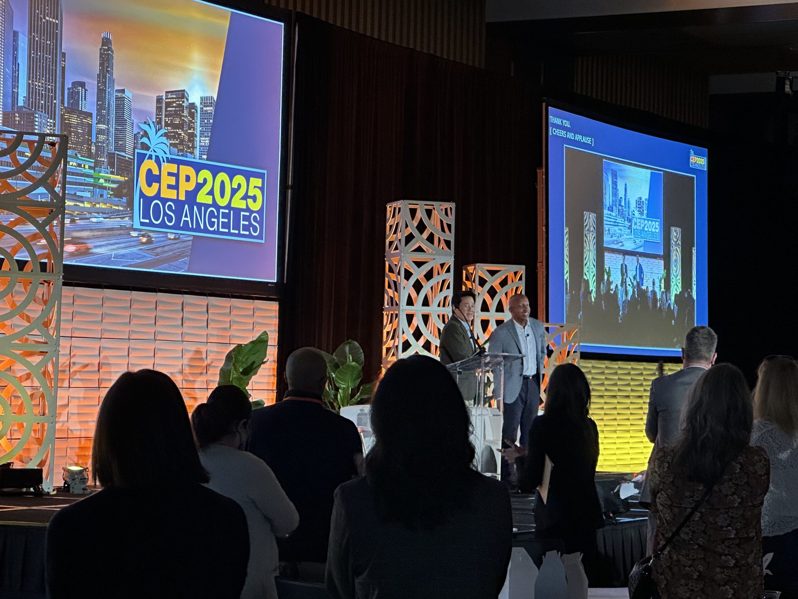 Bryan Stevenson standing with Don Chen at end of CEP Conference