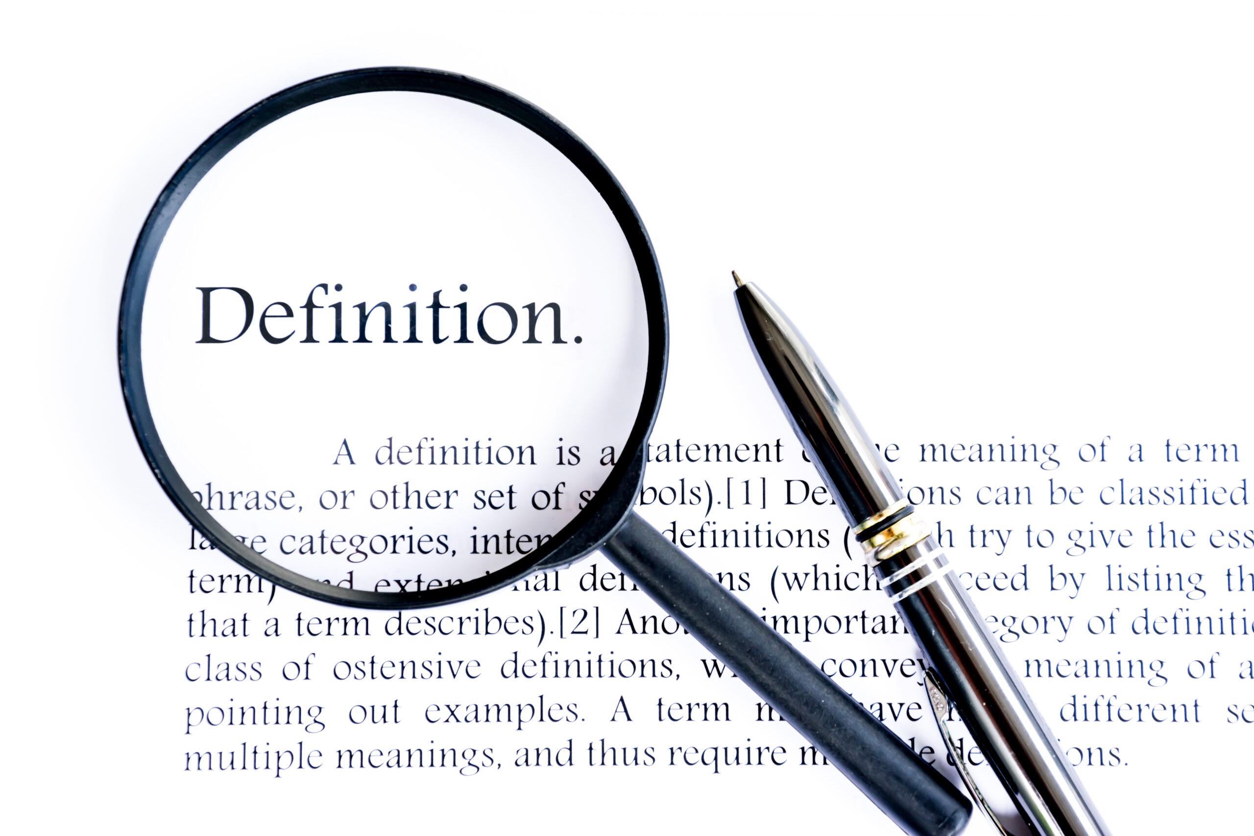 The word "Definition" under a magnifying glass and the definition of the word below