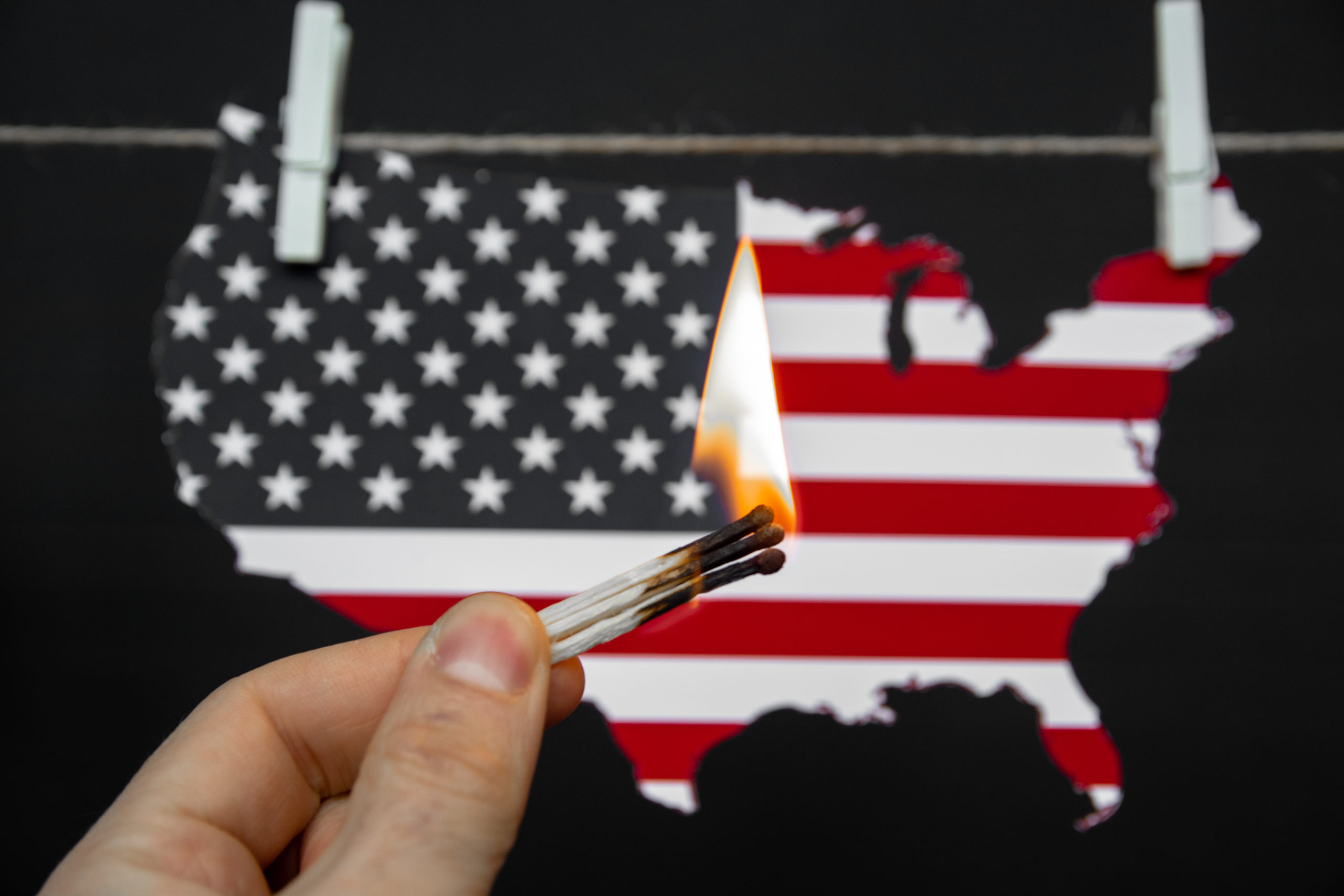 map of america USA burning match - as a symbol of incitement