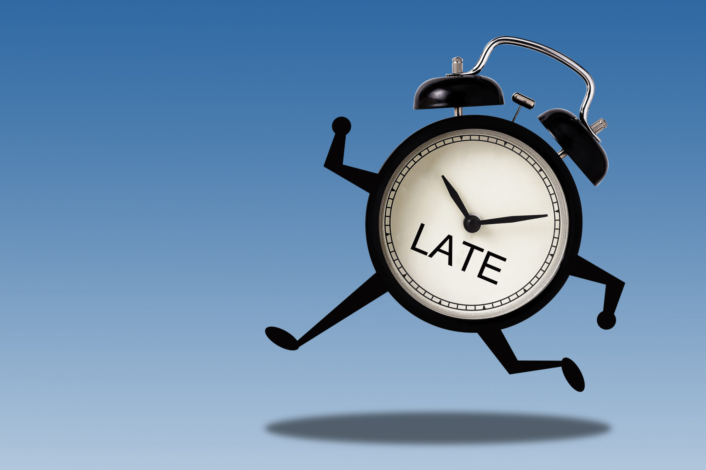 Clock wih the word "LATE" written on its face