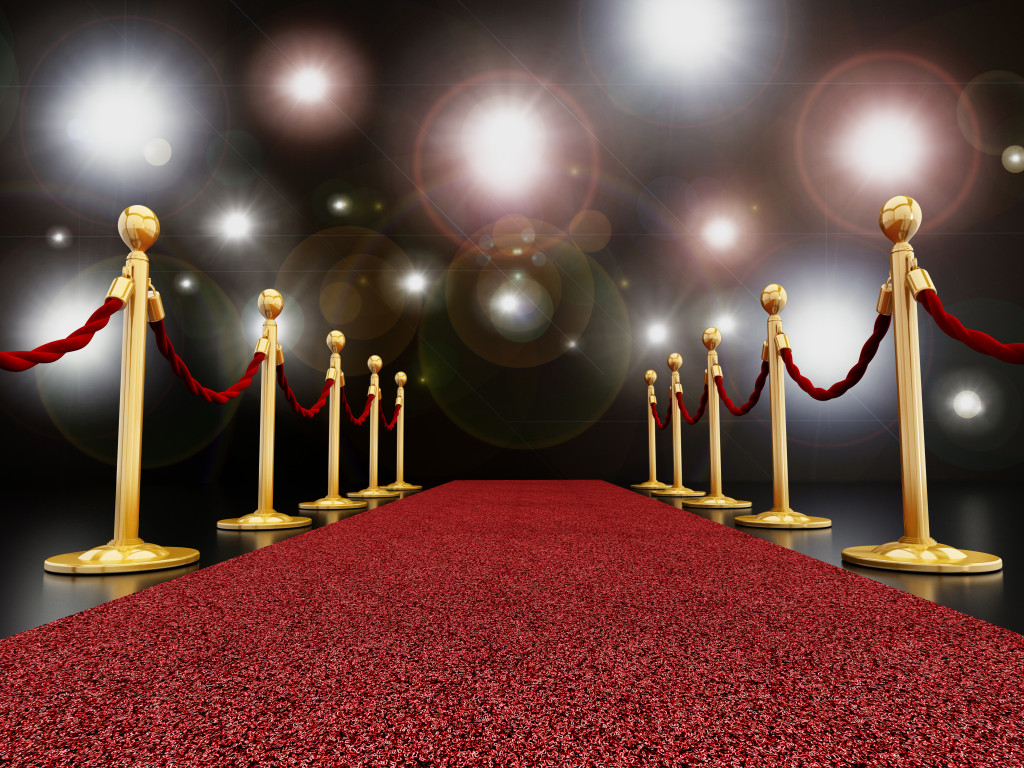 Red carpet at night with flashes concept