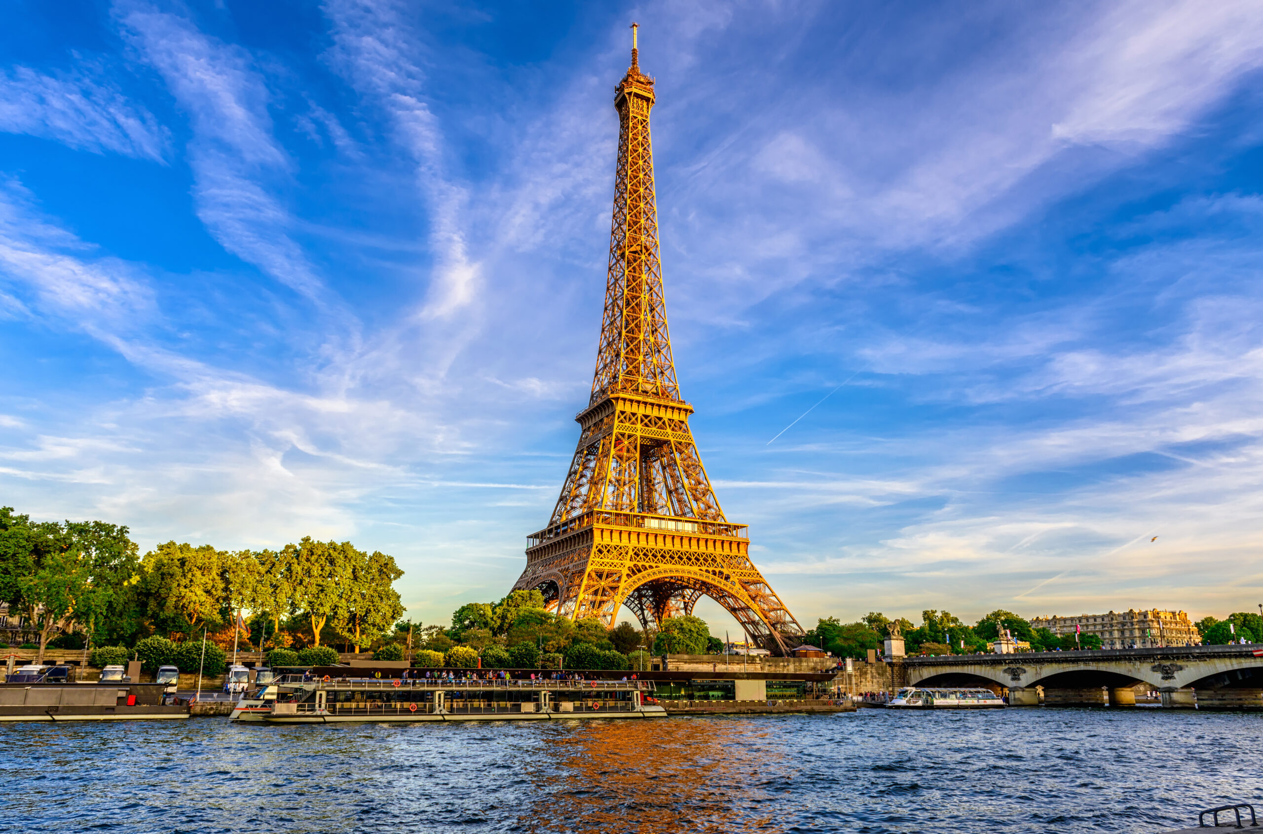 Eiffel Tower and river Seine at sunset in Paris, France.