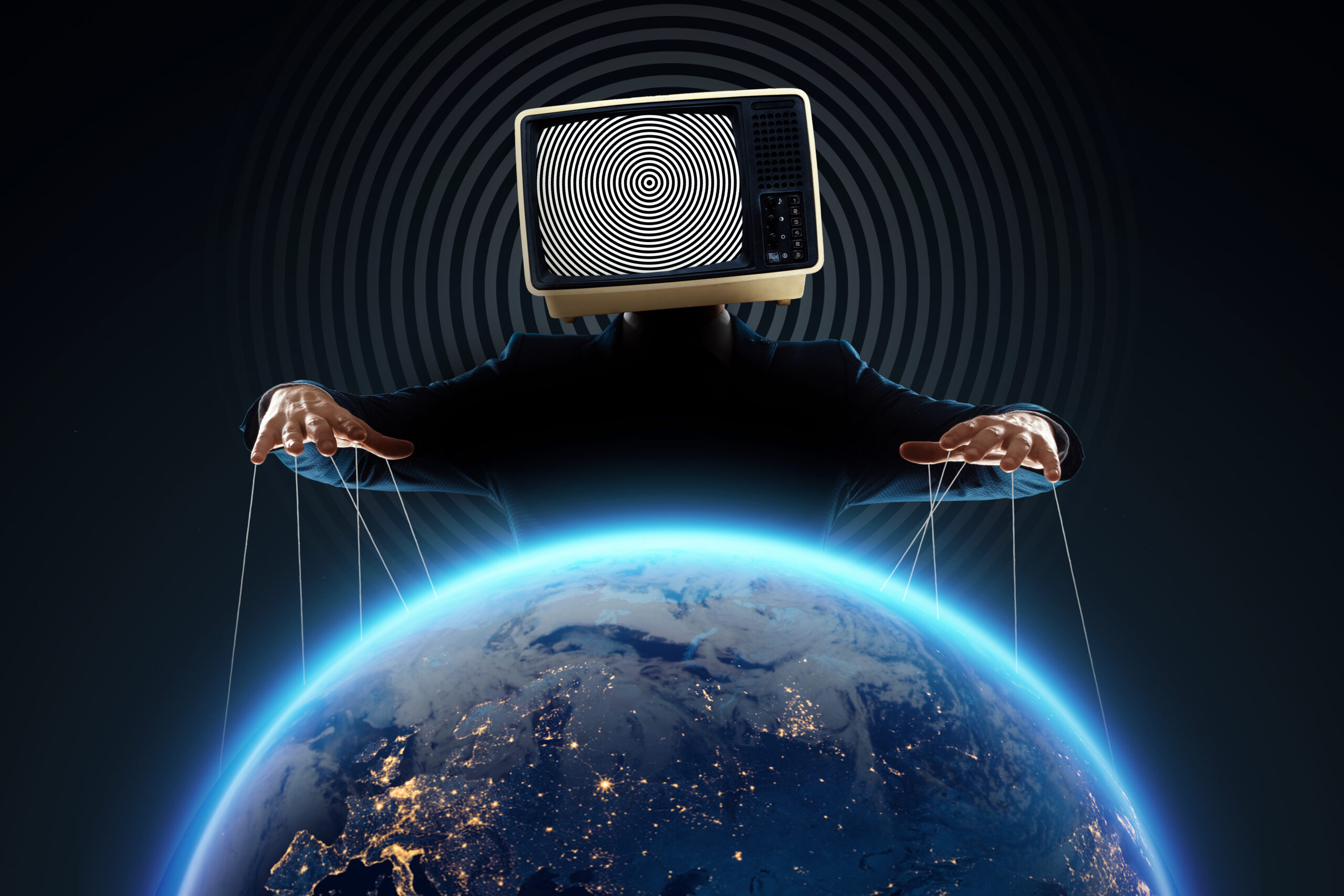 Television set head with hands manipulating parts of the globe with wires.