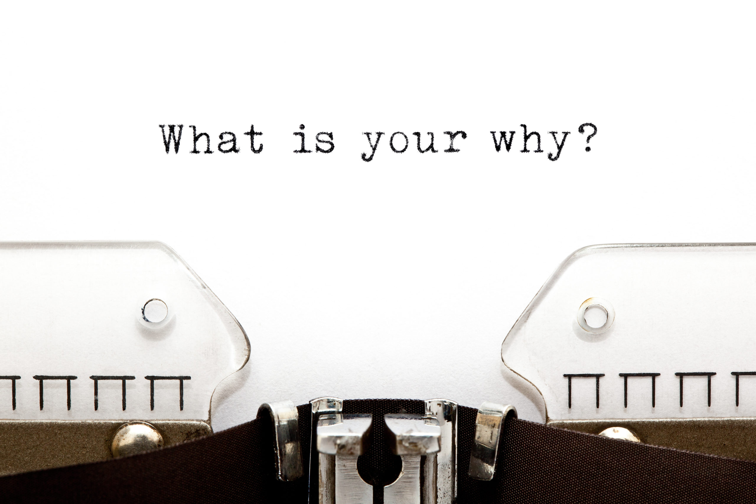 What Is Your Why typed on vintage typewriter