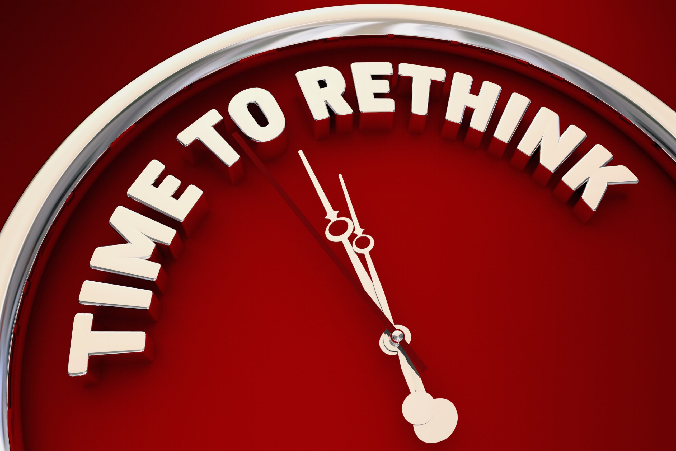 "TIME TO RETHINK" printed on a clock