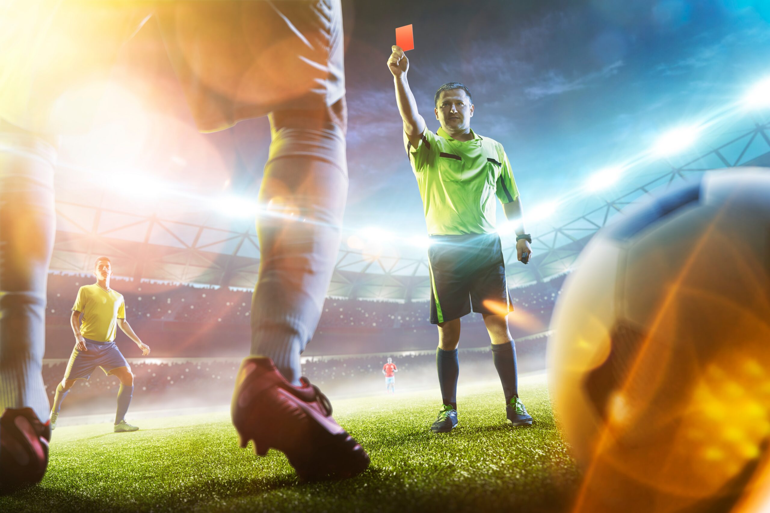 Soccer referee showing a red card