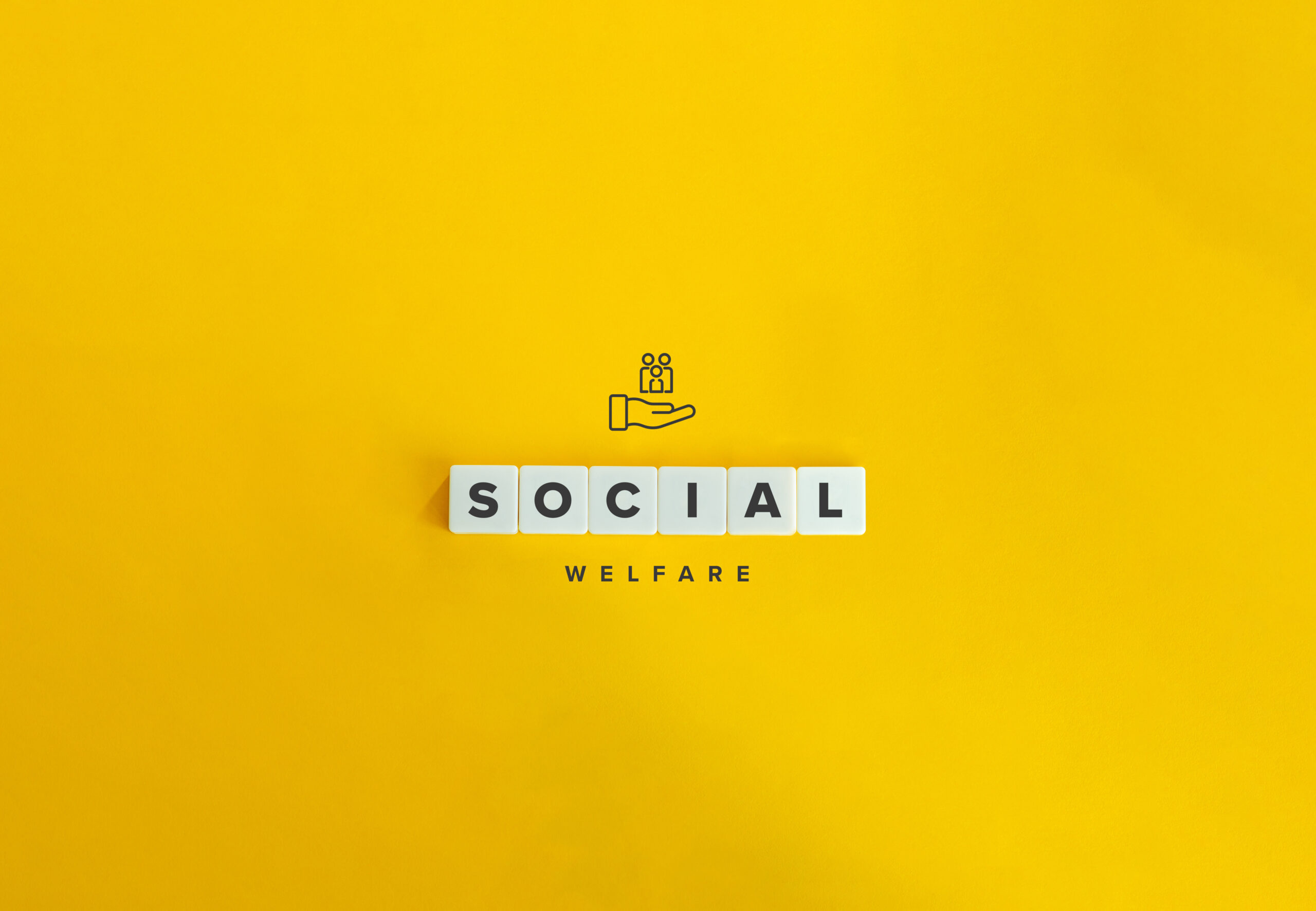 "SOCIAL" in tile letters and "WELFARE" in smaller font against a yellow background