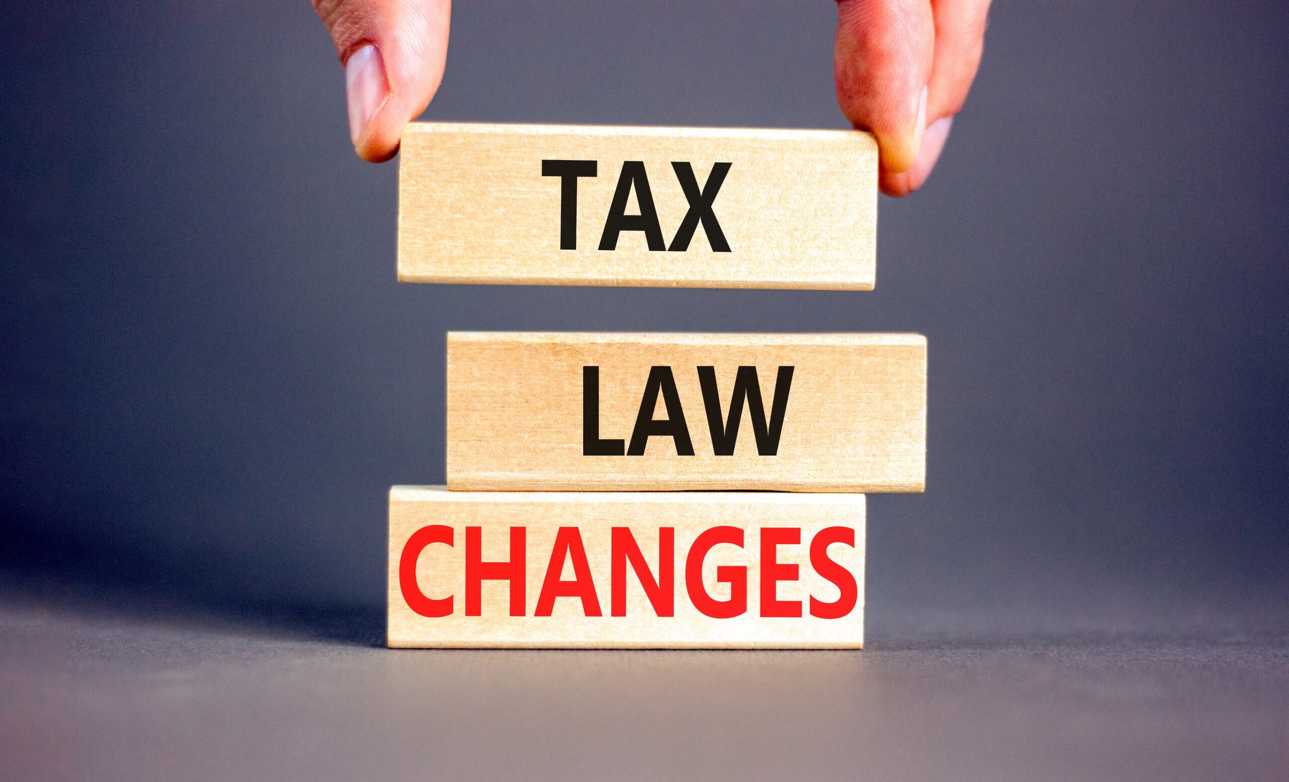 "TAX" "LAW" "CHANGES" on wooden blocks
