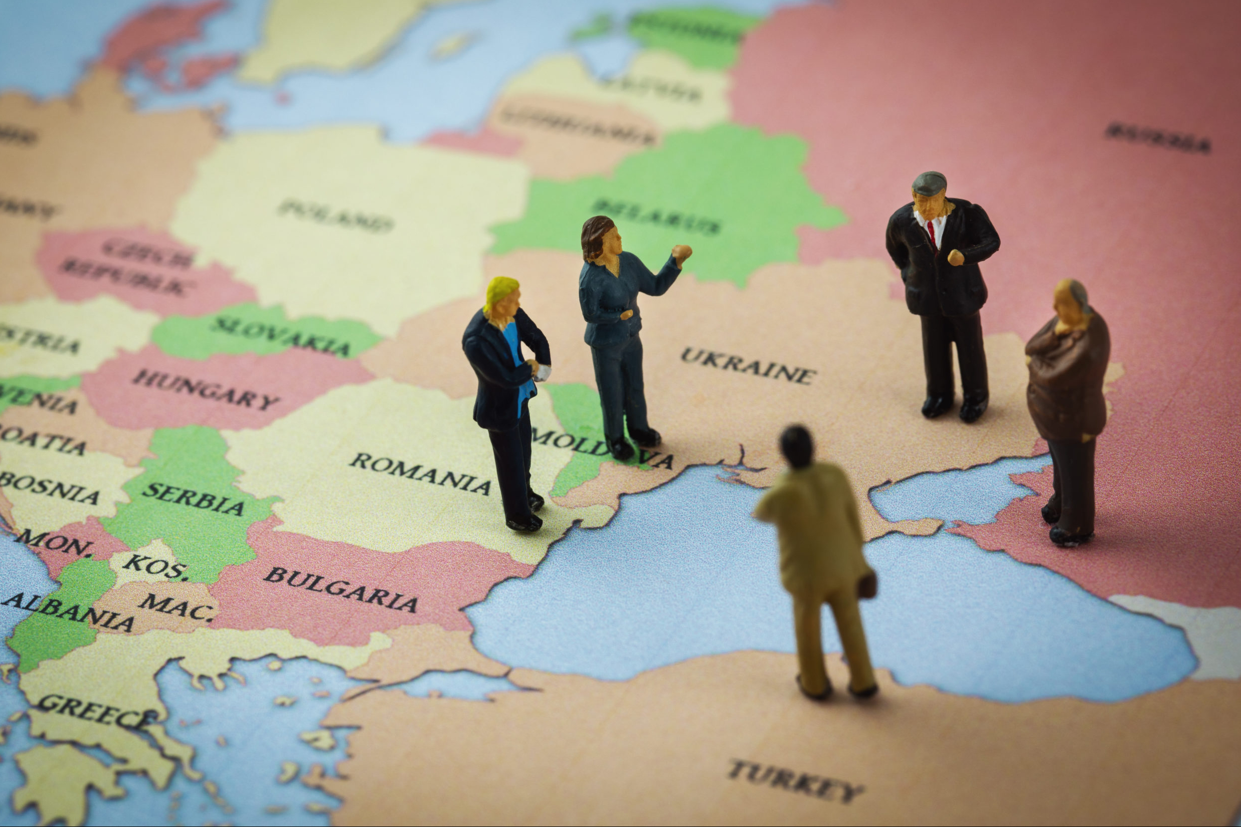 figurines standing on the europe map around the azov and black s
